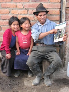 Don Juan Sharing An Educational Magazine With The Local Kids